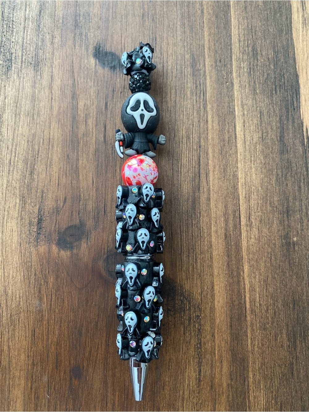 Black Ghost-Face Beaded Ballpoint Pen with Red Accent Bead